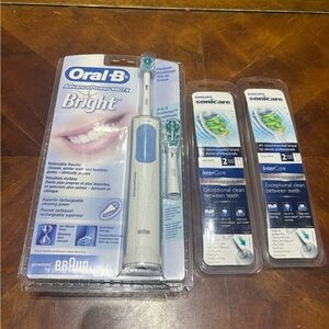 Oral-B Electric Toothbrush with Philips Sonicare Brush Heads